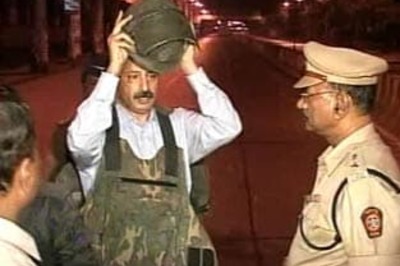 Report ends speculation, Karkare fell to terrorists