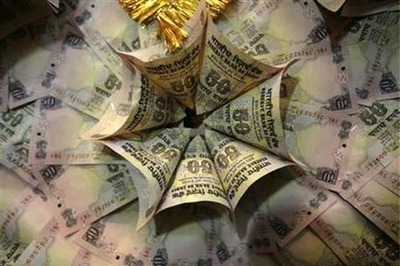 Rupee likely to trade in 55-56 a dollar