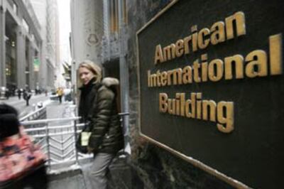 AIG employees hand over bonuses