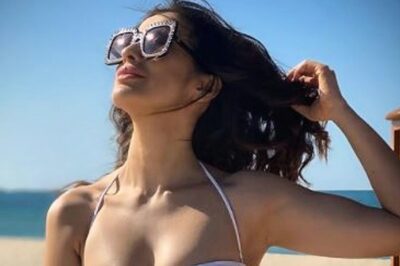 South Star Raai Laxmi Sizzles in White Bikini in Beach Pics
