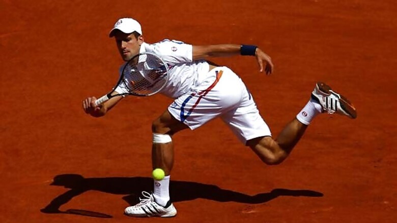 Djokovic makes a winning start in Italy