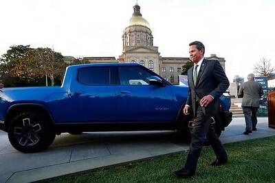 Upstart Electric Vehicle Maker Rivian Posts $1.23B Q3 Loss