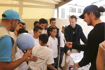 Syrian Teens Tell UNICEF Envoy Liam Neeson About Exile