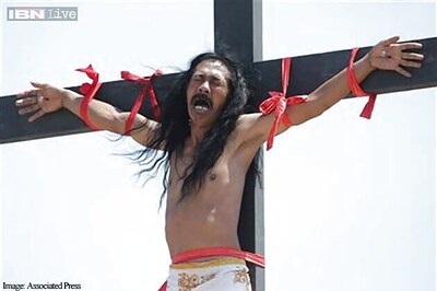 Filipino devotees nailed to crosses in Good Friday rites