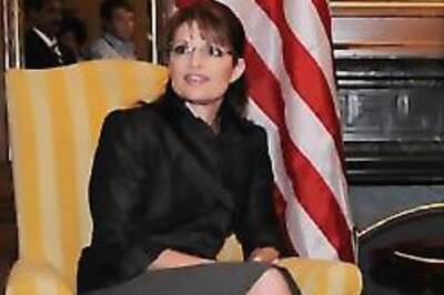 Images: 'Hockey mom' Palin meets father of reforms Manmohan