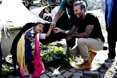 David Beckham plays soccer with Nepalese children