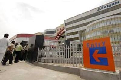 Mahindra Satyam shares tumble on new charges