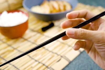 Holding Chopsticks Properly (With Asian Dining Etiquette Tips)