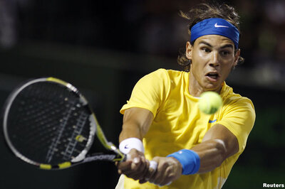 Nadal beaten as Federer, Djokovic march on