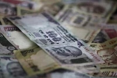 Rupee ends 14 paise lower against US dollar at 58.77