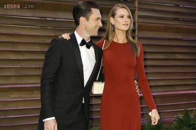 Adam Levine walks down the aisle with Behati Prinsloo in Mexico