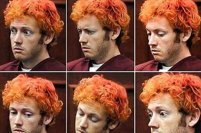 Batman shooting suspect in court with orange hair