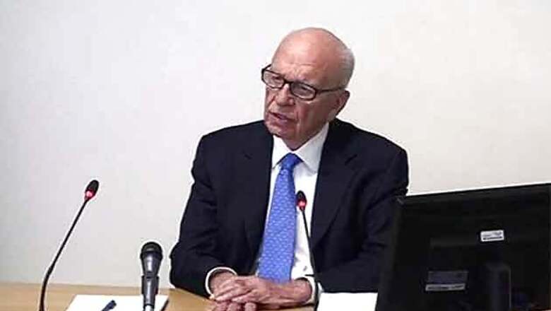 News Corp approves Murdoch plan to split company