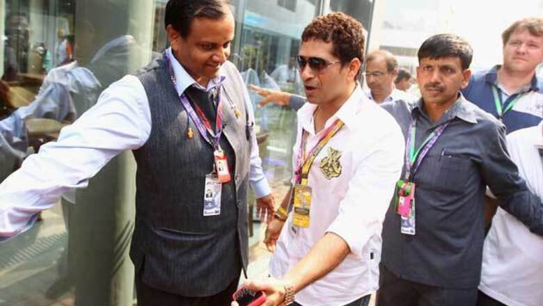 Waving chequered flag a great moment: Sachin