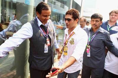Waving chequered flag a great moment: Sachin
