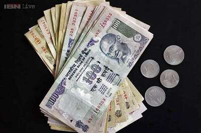 Rupee closes at 59.90 vs US dollar