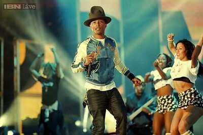 'Happy' singer Pharrell Williams chucks expensive bling for holistic jewellery