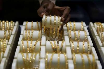 Gold Slips from Near Eight-year Peak as Coronavirus Surge Drives Cash Hunt