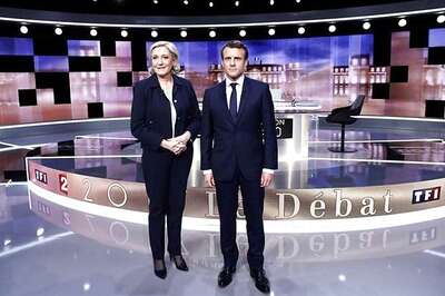 Macron, Le Pen Face Off as France Votes in Watershed Presidential Election