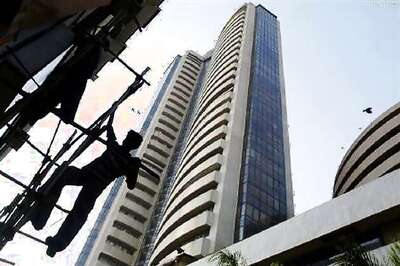 Sensex closes 303 points up