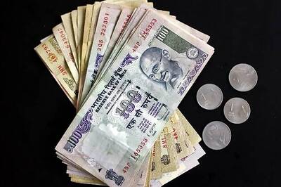 Rupee gains 19 paise to 51.97 against dollar