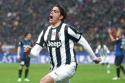 Leaders Juventus, AC Milan sweat for victories