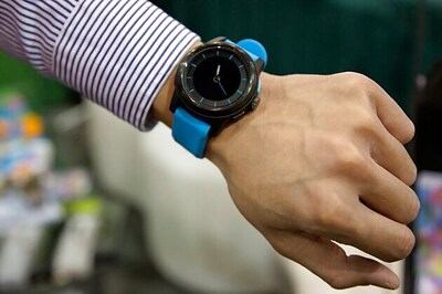 A smartwatch runs for a year on a standard button cell