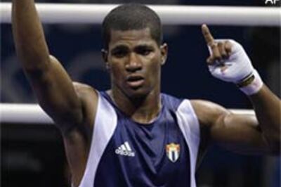 Cuban boxers close in on historic eight golds