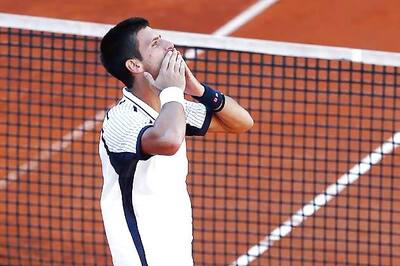 Novak Djokovic cruises but Li Na bows out in rainy Paris
