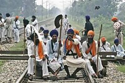 Sikh groups block trains, want Dera chief arrested