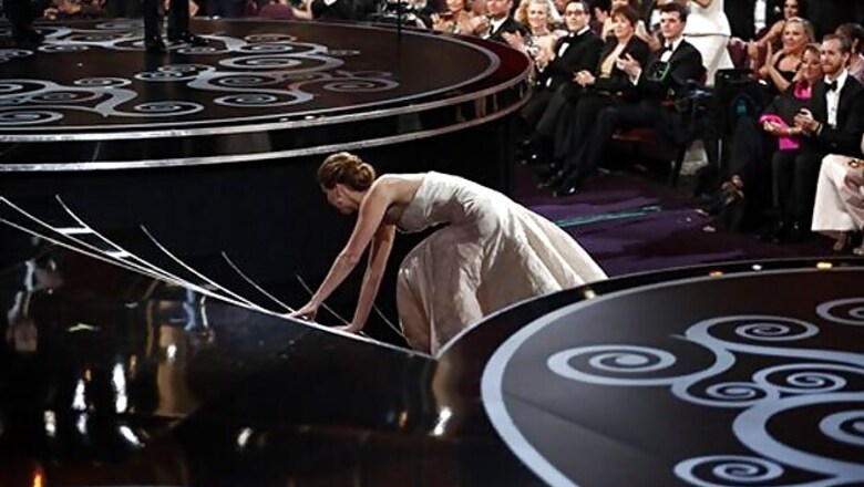 Jennifer Lawrence gives her Oscar away to her parents