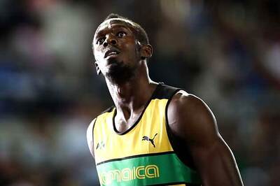 Olympics: Usain Bolt breezes into 200m semis
