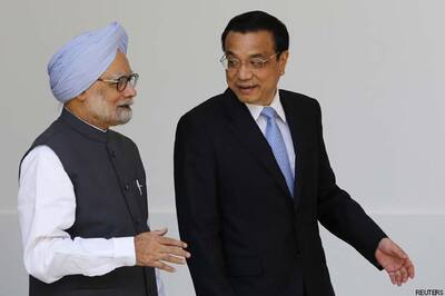 With wary eye on the US, China courts India
