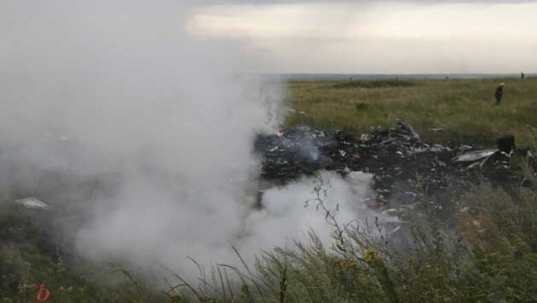 Burning wreckage, bodies scattered after airliner crashes in Ukraine