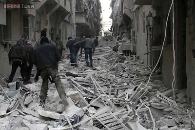 Syrian forces kill 83 in barrel bomb attacks in Aleppo