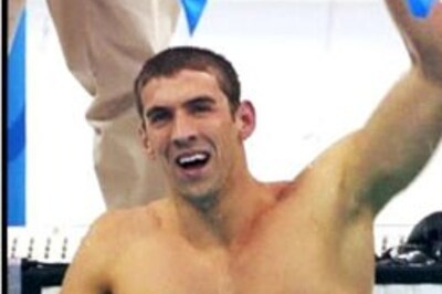 US relay triumph lifts Phelps to historic eighth gold