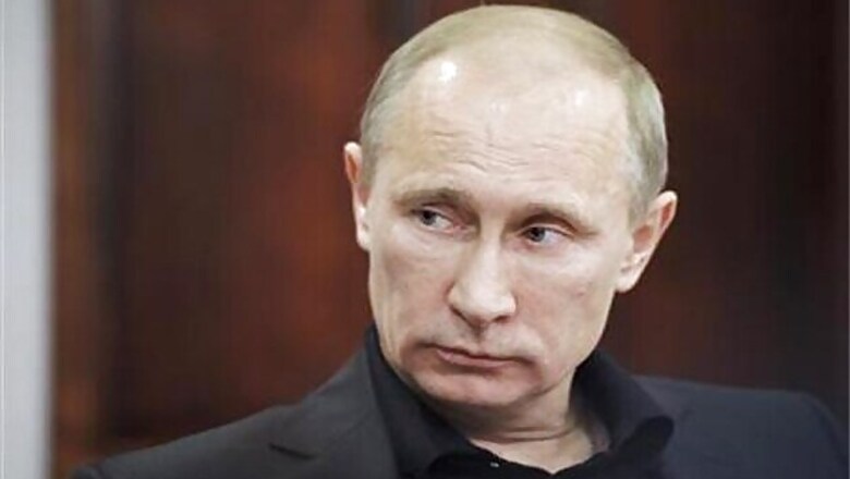 Putin dominates G-7 summit in Absentia