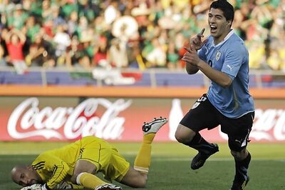 Uruguay sail into second round after 1-0 win