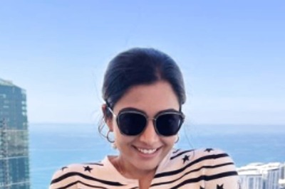 Rashmika Mandanna Cutely Flexes Her Muscles in Crop Top and Jeans, Poses by the Sea