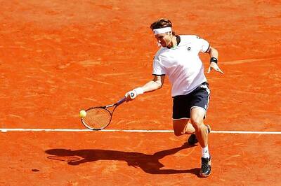 Ruthless Ferrer crushes Robredo to reach semi-finals