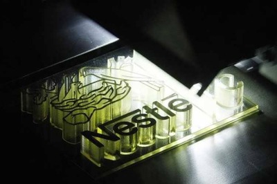 Nestle shares reel under regulatory pressure, down 3%