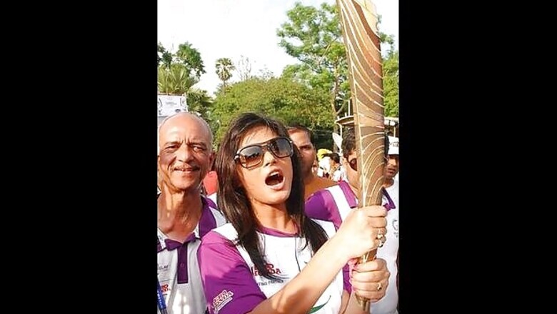 Neetu Chandra carries the Queen's Baton