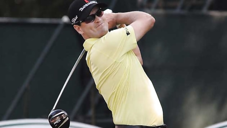 Zach Johnson takes leads at British Open