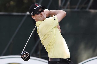 Zach Johnson takes leads at British Open