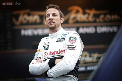 Jenson Button waits as McLaren fail to decide