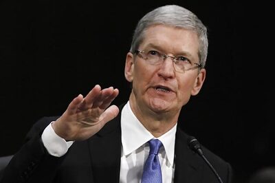 Apple CEO Tim Cook promises new products, takes potshots at Google's Android