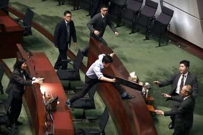 Pro-Democracy Leaders Dragged Out of Hong Kong Assembly After Demanding Probe in Brutal Attack on Rights Activist