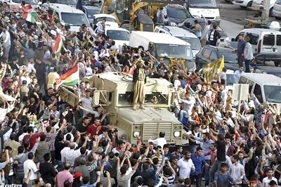 Iraqi Kurdish forces enter Syria to fight Islamic State