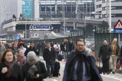 Belgian PM says Brussels hit by 'blind, violent, cowardly' attacks