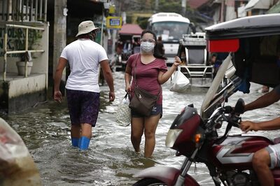 Philippines Reels Under Worst Flood in 45 Years, Typhoon Death Toll Rises